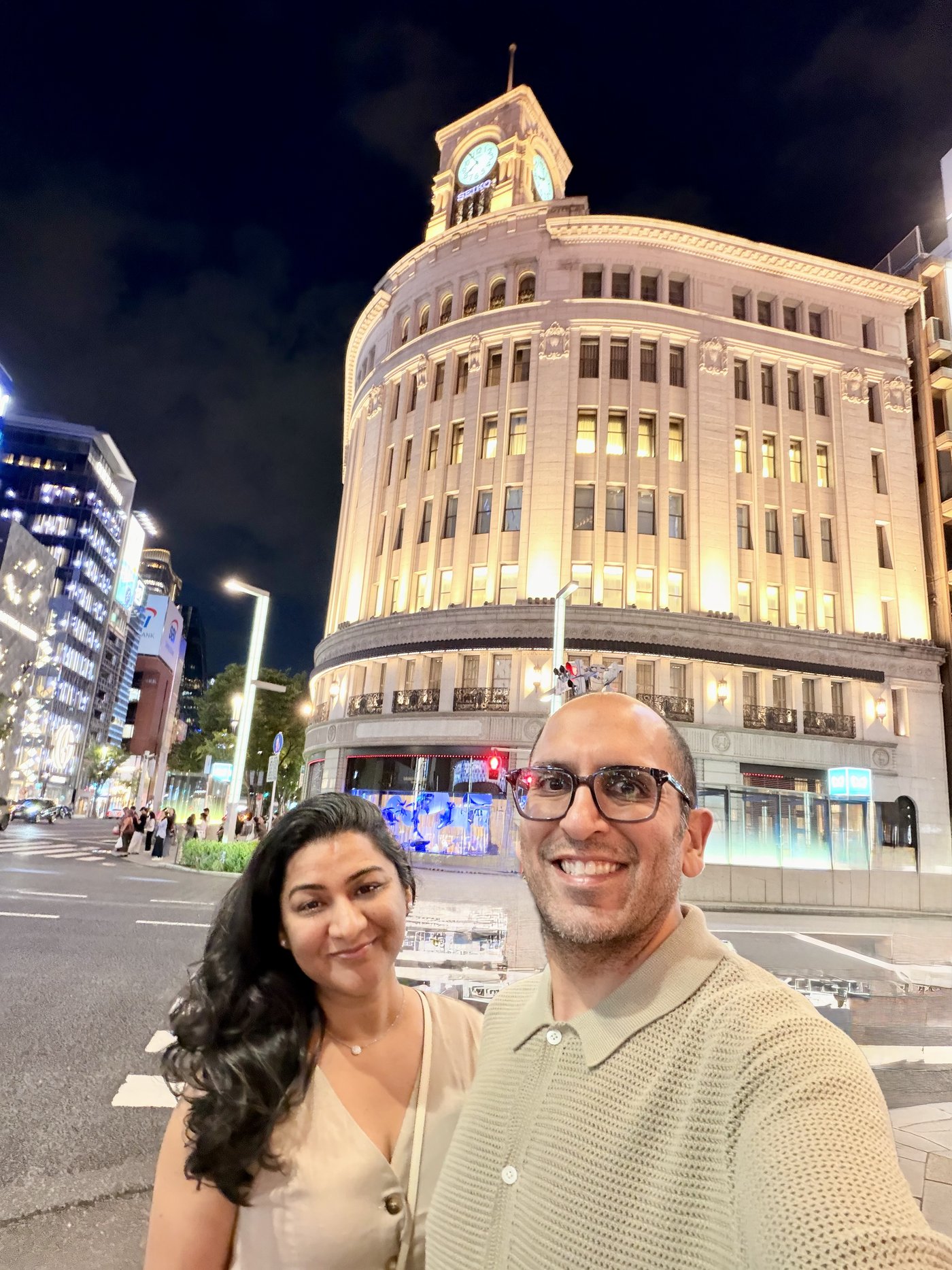 The parents on their first evening out in the lights of Ginza
